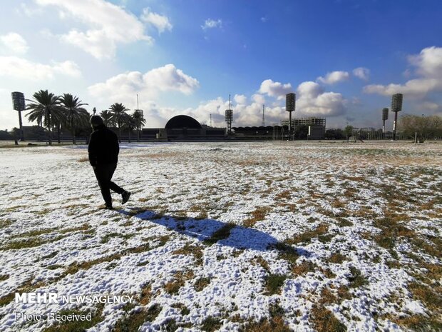 فرحة العراقيين بالثلوج بعد انقطاع طويل