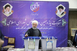 Top Iranian officials cast votes in early hours of election day