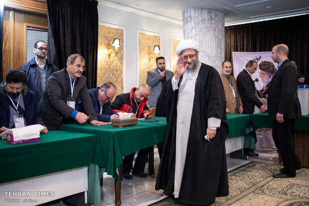 Top Iranian officials cast votes in early hours of election day