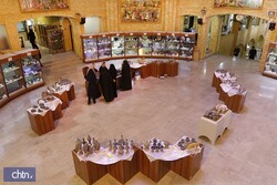 Sets of enameled pottery on display at Tehran exhibit