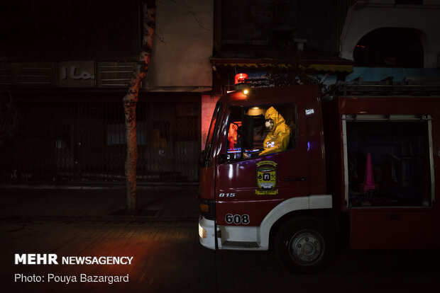 Firefighters help disinfecting public places in Rasht