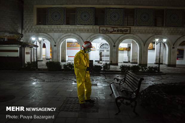 Firefighters help disinfecting public places in Rasht