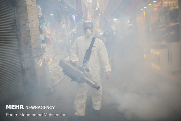 Disinfecting Valiasr St. in Tehran due to coronavirus outbreak
