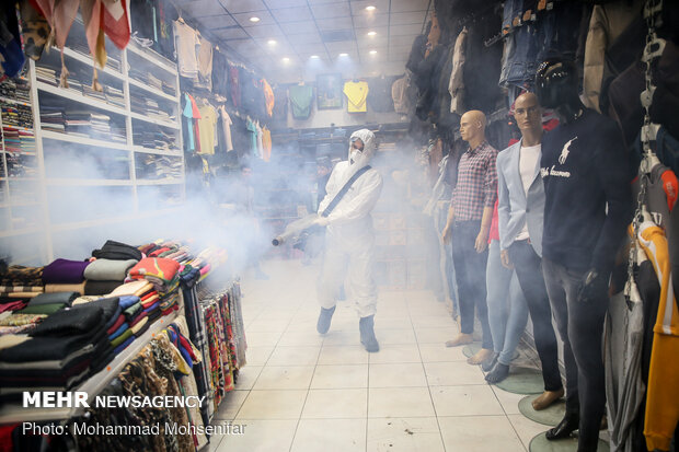 Disinfecting Valiasr St. in Tehran due to coronavirus outbreak
