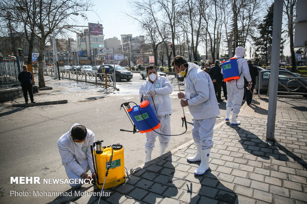 Disinfecting Valiasr St. in Tehran due to coronavirus outbreak
