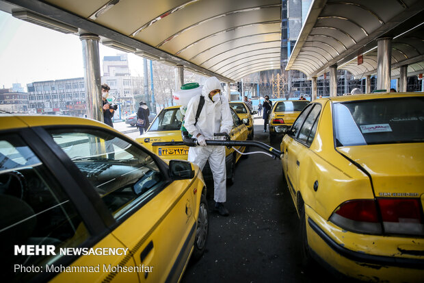 Disinfecting Valiasr St. in Tehran due to coronavirus outbreak
