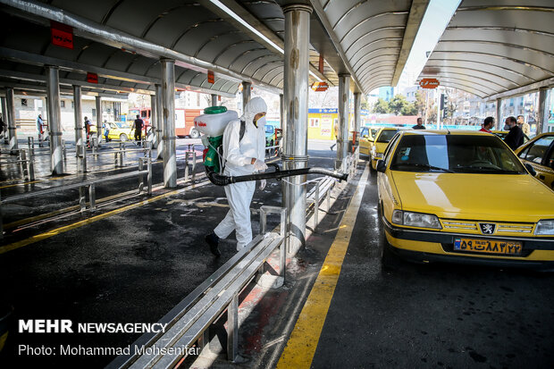 Disinfecting Valiasr St. in Tehran due to coronavirus outbreak
