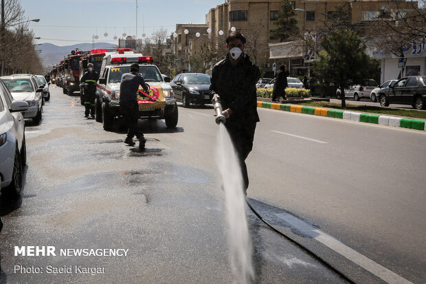 Disinfecting public places in Mashhad against COVID-19
