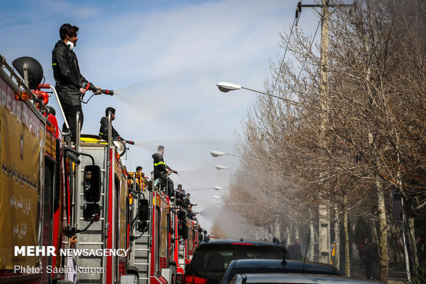 Disinfecting public places in Mashhad against COVID-19
