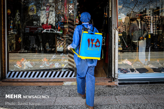 Disinfecting public places in Mashhad against COVID-19
