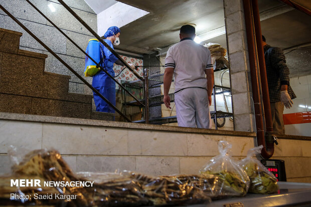 Disinfecting public places in Mashhad against COVID-19
