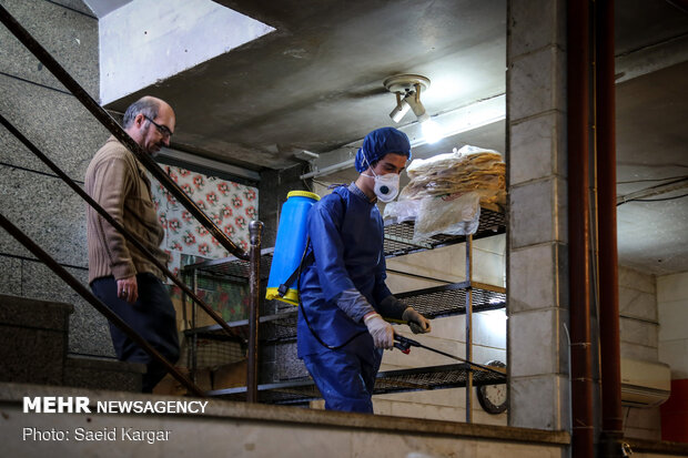 Disinfecting public places in Mashhad against COVID-19
