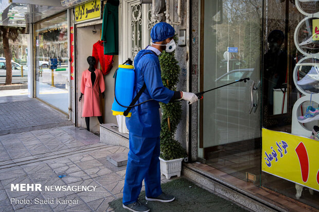 Disinfecting public places in Mashhad against COVID-19
