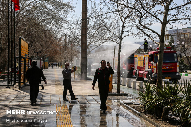 Disinfecting public places in Mashhad against COVID-19
