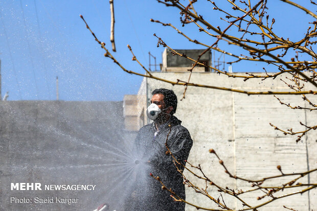 Disinfecting public places in Mashhad against COVID-19
