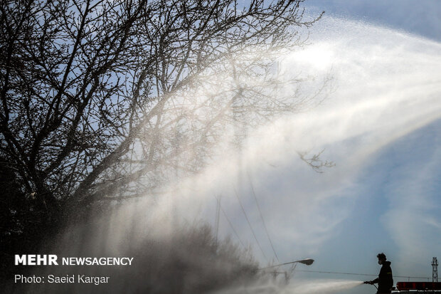 Disinfecting public places in Mashhad against COVID-19
