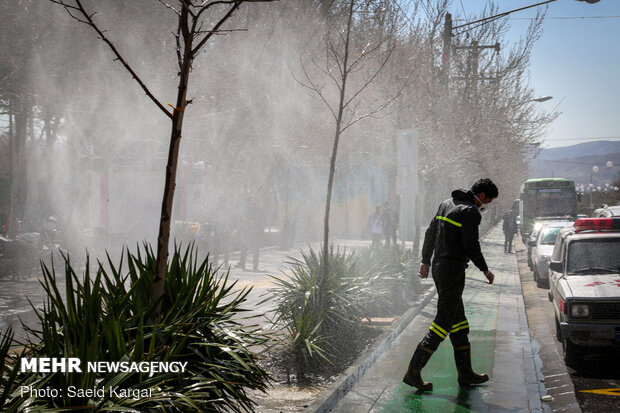 Disinfecting public places in Mashhad against COVID-19
