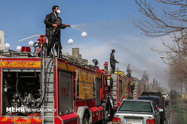 Disinfecting public places in Mashhad against COVID-19
