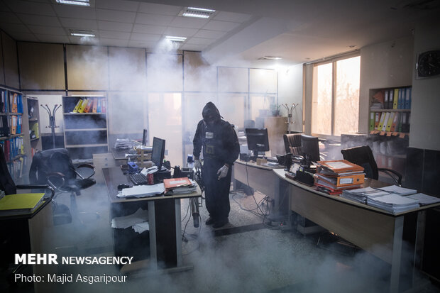 Disinfecting one of Tehran’s neighborhoods against COVID-19