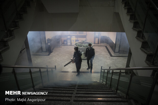 Disinfecting one of Tehran’s neighborhoods against COVID-19