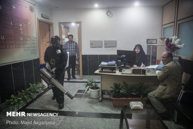 Disinfecting one of Tehran’s neighborhoods against COVID-19