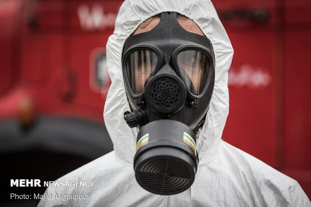 Disinfecting one of Tehran’s neighborhoods against COVID-19