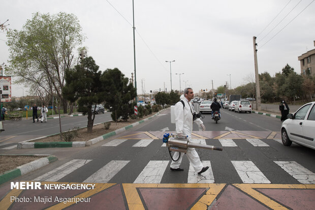 Disinfecting one of Tehran’s neighborhoods against COVID-19