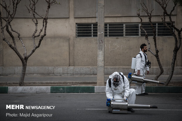 Disinfecting one of Tehran’s neighborhoods against COVID-19