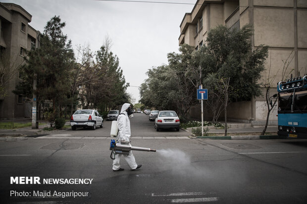 Disinfecting one of Tehran’s neighborhoods against COVID-19