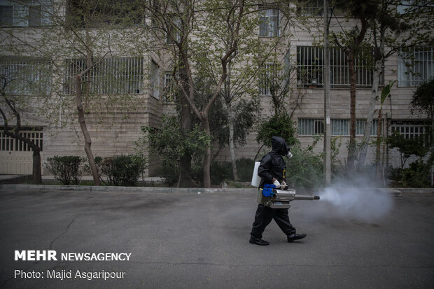 Disinfecting one of Tehran’s neighborhoods against COVID-19