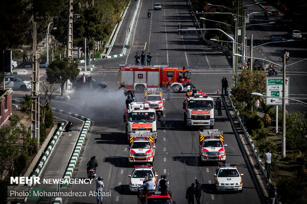 Firefighters disinfecting a neighborhood in E Tehran
