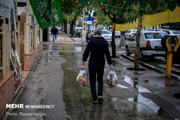 Distributing food supplies to underprivileged families in Mashhad