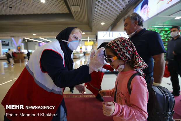 Disinfecting, monitoring health of passengers in Kish