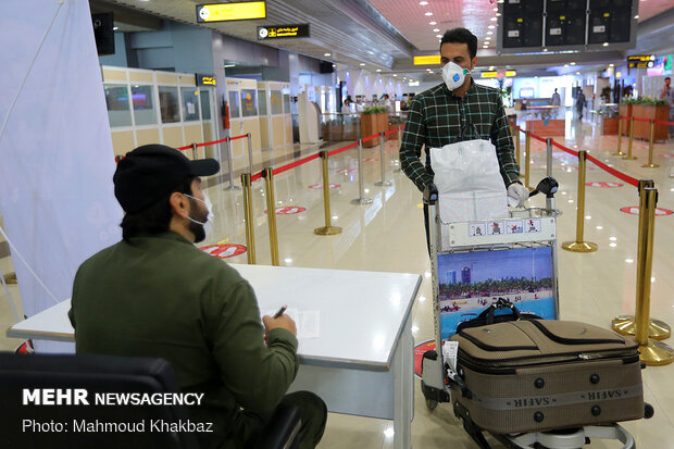 Disinfecting, monitoring health of passengers in Kish