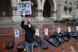 VIDEO: Protesters leave body bags outside Trump Hotel in Washington