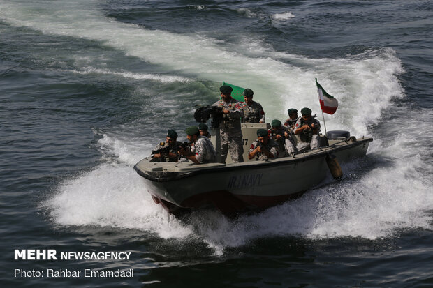 Iran's flag hoisted atop frigate Jamaran in Bandar Abbas