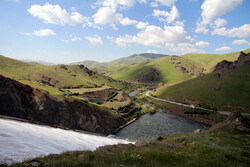 Vahdat Dam in Kurdestan province overflows