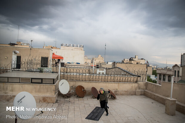 Iranians working out on rooftops amid the pandemic