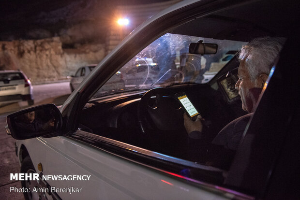 People of Shiraz observe Night of Decree in personal cars amid pandemic