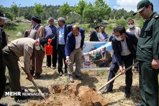 Planting olive sapling to mark Intl. Quds Day
