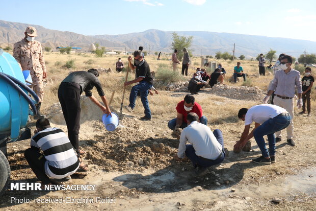 مراسم خاکسپاری شهید فخرالدین فلک نازی در روستای دهتل