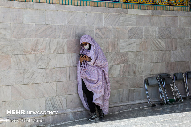 Pilgrims visiting Imam Reza holy shrine preserving anti-coronavirus protocols