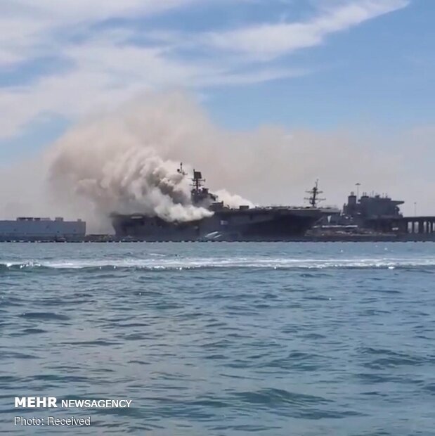 انفجار و آتش سوزی در یک فروند ناو جنگی آمریکا