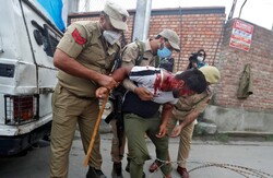 Indian police breaks up mourning processions in Kashmir
