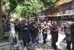 دسته عزاداران حسینی در خیابان‌های بانکوک