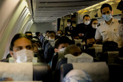 مسافران مشکوک به کرونا در پرواز، از سایر مسافران جدا می شوند