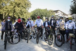 Ambassadors to Tehran ride bicycles with city Mayor