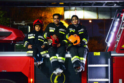 Iranian firefighters and their families in Isfahan