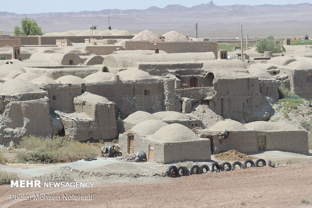 Khor brilliant village in desert 