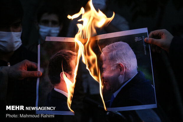 People hold protest in front of French Embassy in Tehran 